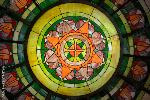 Art deco colorful floral styled decoration on walls  cellar and lights in traditional French cafe bouillon