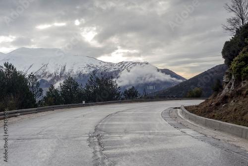 Winter in the mountains (Epirus region, Greece) and country road on a winter day
