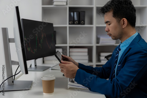 Wallpaper Mural Forex traders Man in front of multiple computer monitors Automated computer monitor of business processes from financial stock analysis data graphs. Torontodigital.ca