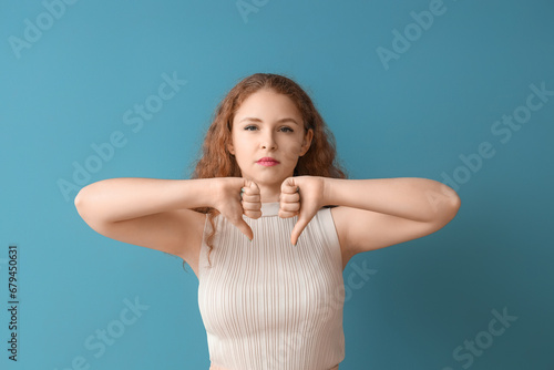 Young woman showing dislike...