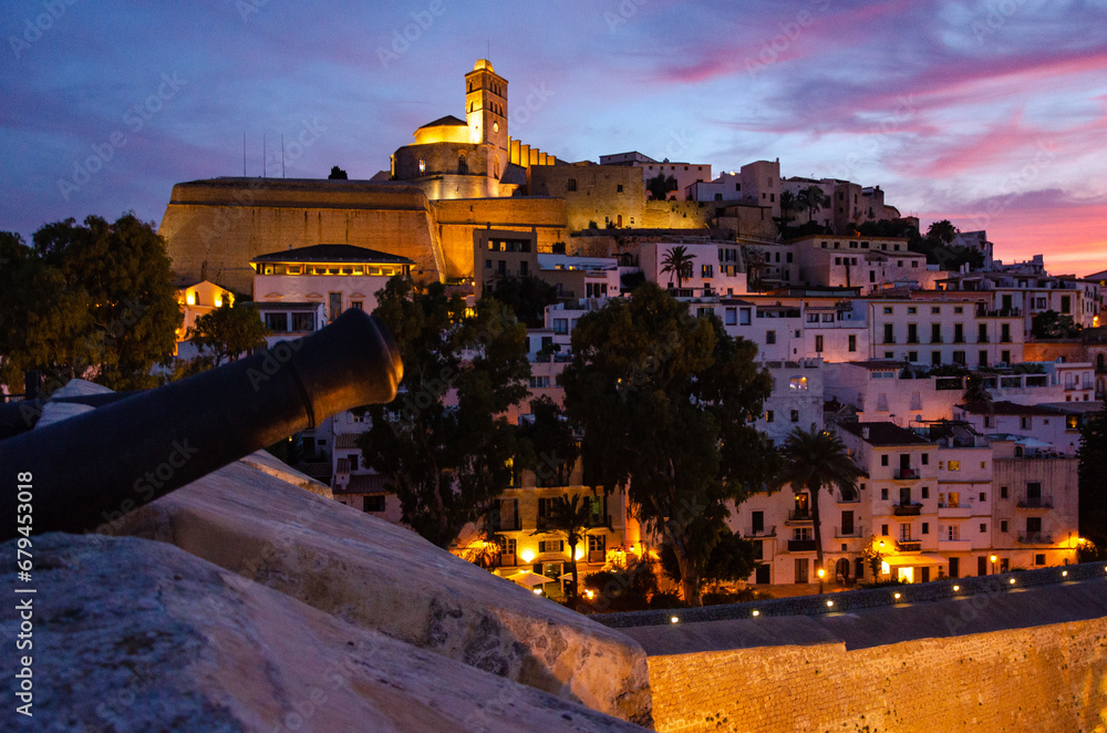 After dusk in Ibiza's historic old town. Historic buildings and cathedrals shimmer in this historical walled city