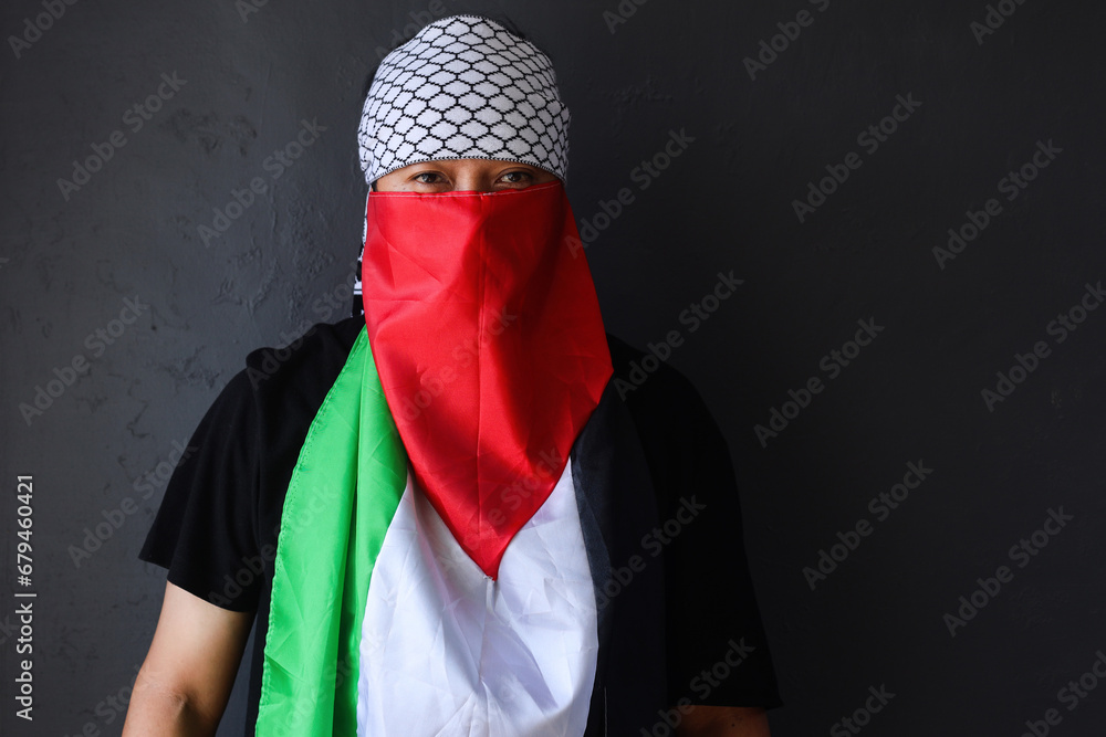 Portrait of man with Palestine flag. Symbol of support.