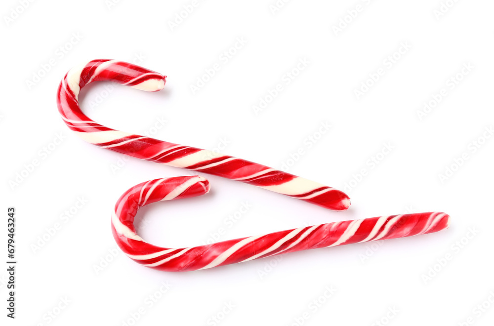 Fototapeta premium Sweet Christmas candy canes on white background