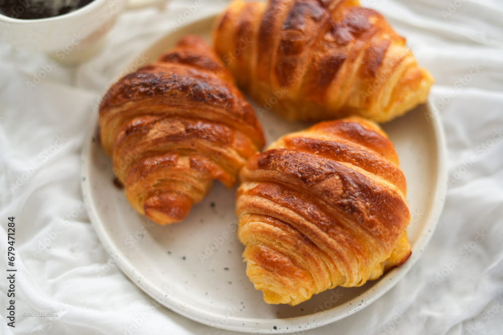 Fototapeta premium Breakfast hot coffee and croissants