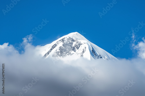 Fototapeta Naklejka Na Ścianę i Meble -  Mountain peak in the clouds, Elbrus, Caucasus, Russia