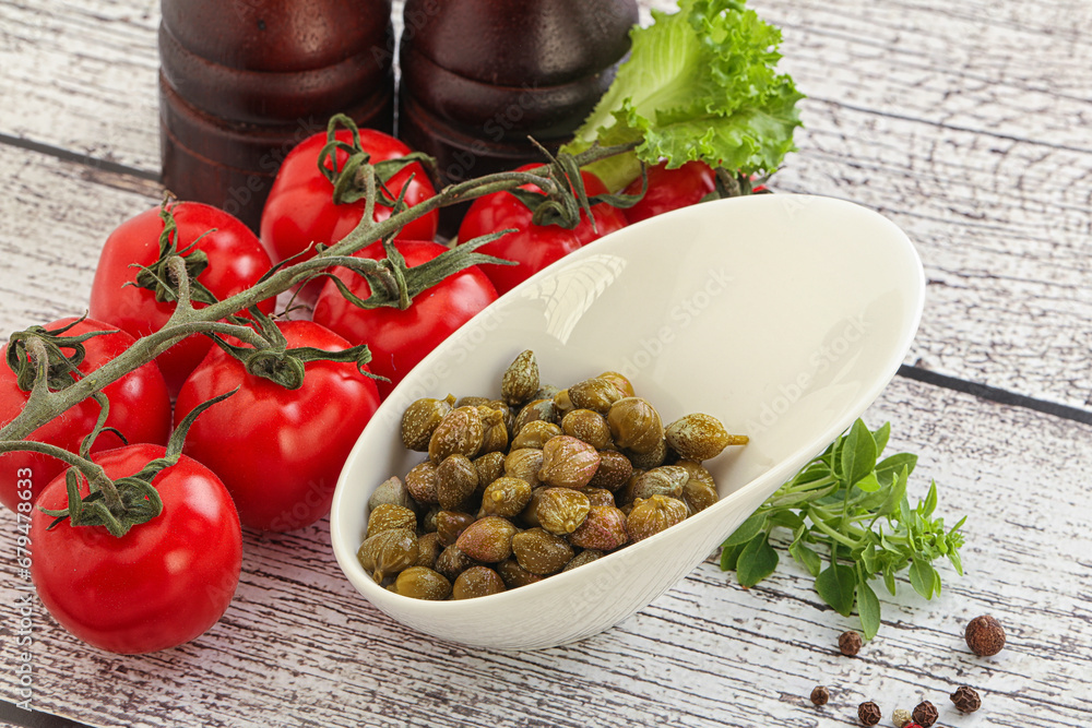 Marinated green capers in the bowl Marinated green capers in the bowl