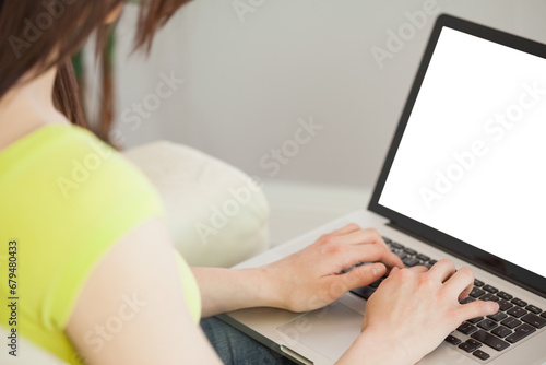 Digital png photo of caucasian woman using laptop with copy space on transparent background