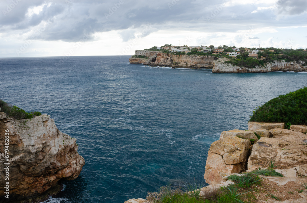 Beautiful sights in Mallorca Spain of the rugged coast, Mediterranean sea and charming architecture