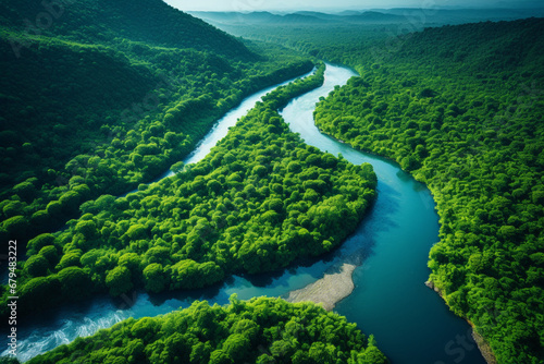 Aerial view of the Amazonas jungle landscape with river bend. © DracolaX