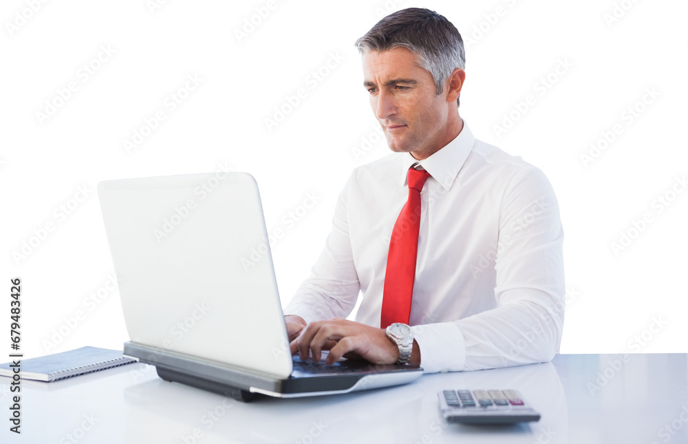 Digital png photo of caucasian businessman using laptop at desk on transparent background Digital png photo of caucasian businessman using laptop at desk on transparent background