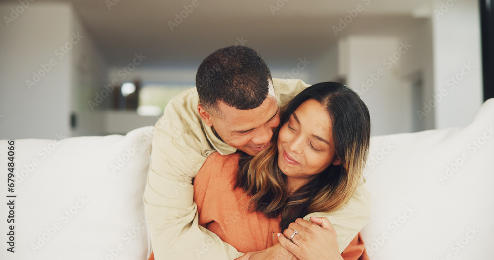 Couple, happy and living room sofa with hug, marriage and embrace with eyes closed. Home, joyful and love for commitment, bonding together and caring for romantic relationship, man and woman Couple, happy and living room sofa with hug, marriage and embrace with eyes closed. Home, joyful and love for commitment, bonding together and caring for romantic relationship, man and woman