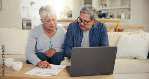 Elderly, couple and laptop with document for financial planning, investment or paperwork for retirement. Senior man, woman and tech with budget for online banking, account or savings in home
