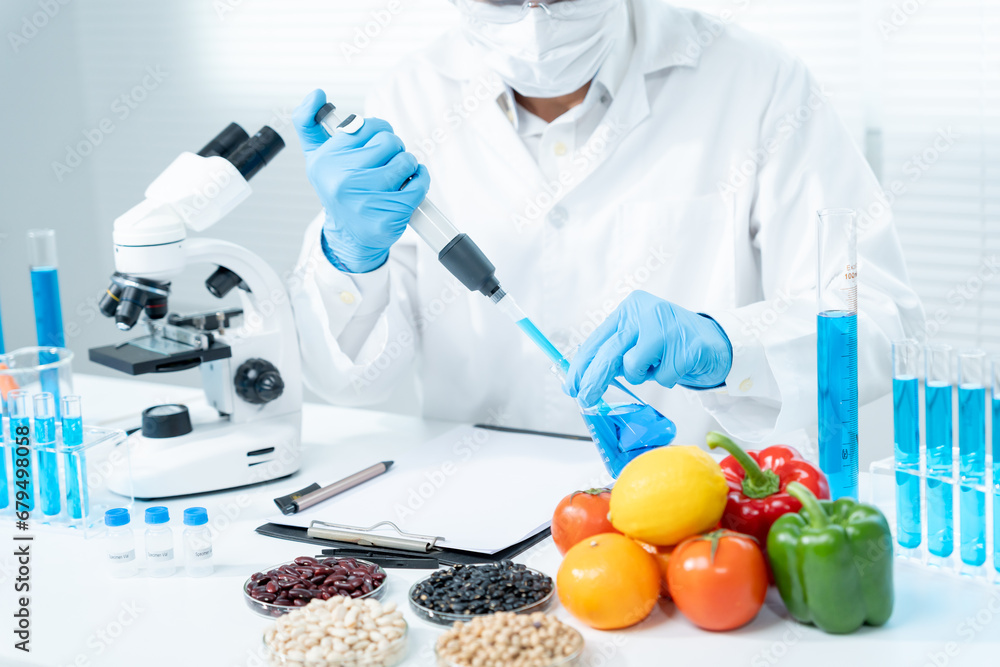 Scientist check chemical food residues in laboratory. Control experts inspect the concentration of chemical residues. hazards, ROHs standard, find prohibited substances, contaminate, Microbiologist Scientist check chemical food residues in laboratory. Control experts inspect the concentration of chemical residues. hazards, ROHs standard, find prohibited substances, contaminate, Microbiologist