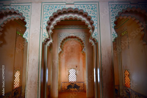 A beautiful and artistic arch carved from stone or marble with 3D effects. This type of amazing architecture is seen in historic and ancient palaces of India.