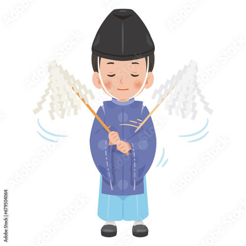 お祓いをする神主の男性