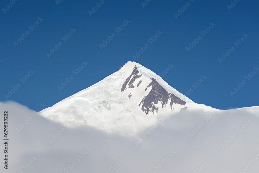 Peak of Mount Elbrus in the clouds, Caucasus, Russia
