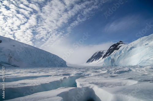 Beautiful view of icebergs in Antarctica on a sunny day. © Robert Kiyosaki