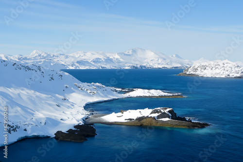Icelandic landscape with mountains, fjords and ocean.