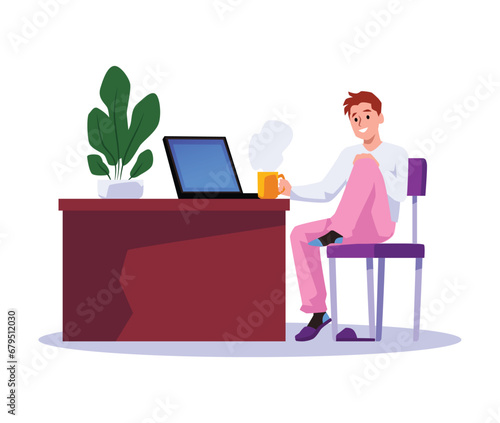 Happy young boy sits at workplace in comfortable position
