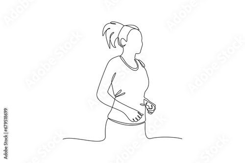 Young woman running at afternoon. Minimalist running sport concept.
