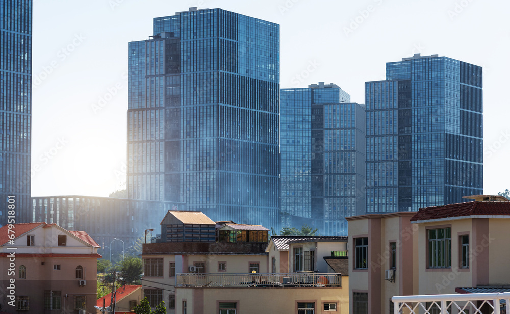 Modern office buildings and old houses in the city Modern office buildings and old houses in the city