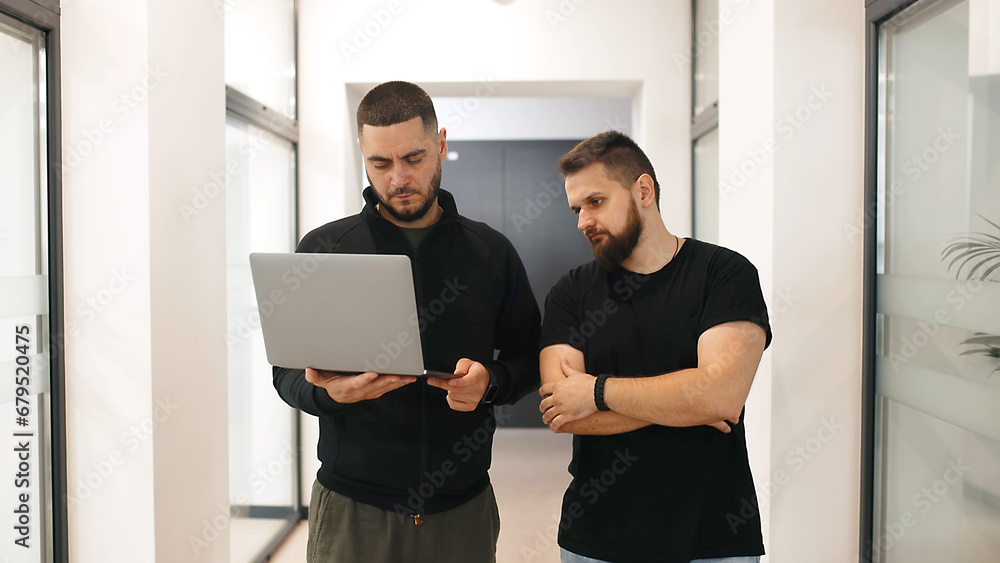 Portrait of successful business people working together in the office. The concept of launching collaboration on a new project Portrait of successful business people working together in the office. The concept of launching collaboration on a new project