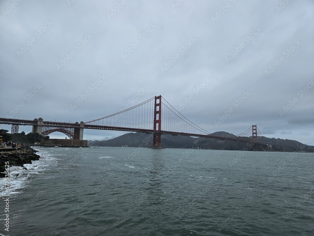 View of Golden gate bridge in San Francisco California from the shoreline of the bay View of Golden gate bridge in San Francisco California from the shoreline of the bay