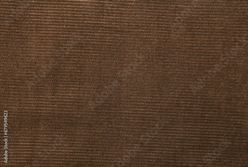 Texture of brown corduroy close-up