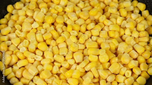 Zoom frame iced canned corn top view, rotating