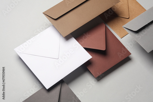 Floating envelopes on gray background with shadow. Minimalism, modern business still life, creative layout