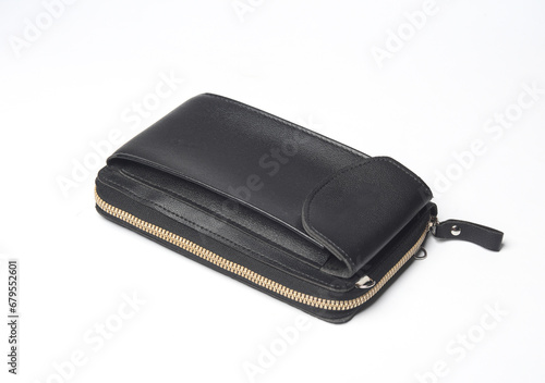 Leather wallet with a pocket for a smartphone on white background
