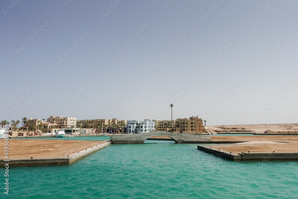 turquoise water with bridges and houses in port ghalib