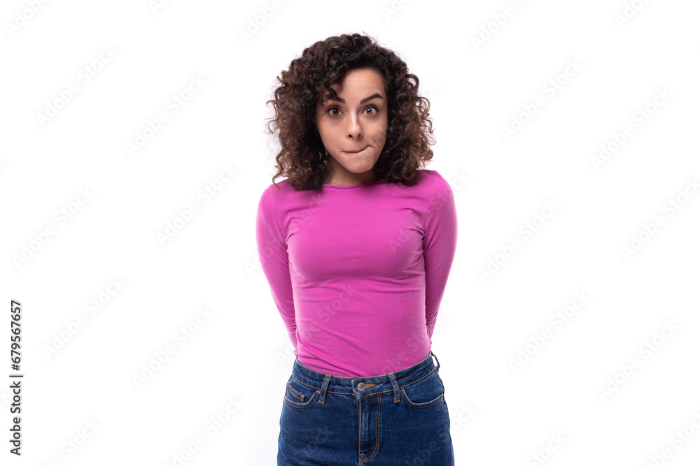 young woman working in advertising dressed in a lilac turtleneck on a white background with copy space young woman working in advertising dressed in a lilac turtleneck on a white background with copy space