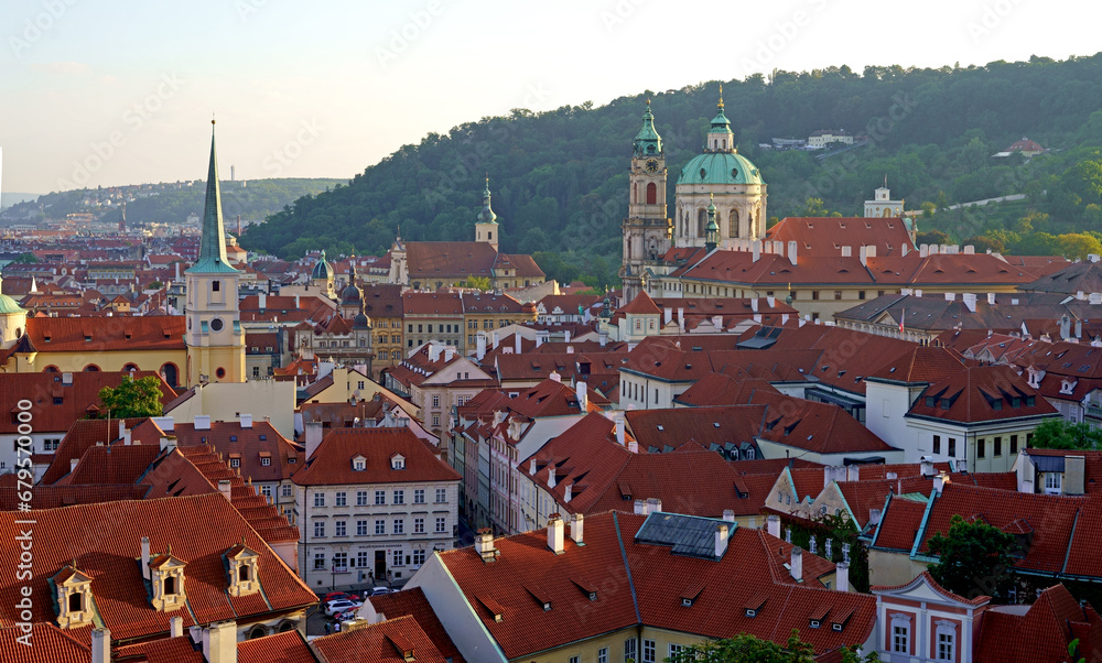 Obraz premium Czech Republic, Prague, September 2023: View of the red tiled roofs of the old town of Prague. Concept - tourism, travel.