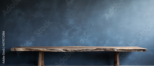 Wood table to present and show product on soft blue wall
