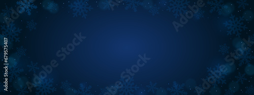 Navy christmas background with snowflakes, bokeh and small sequins