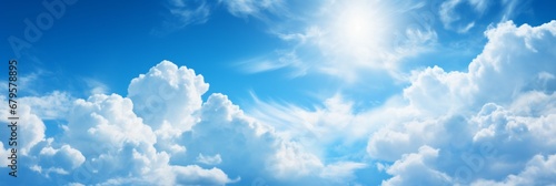 Serene blue sky with fluffy white clouds beautiful background for nature, design, and advertising