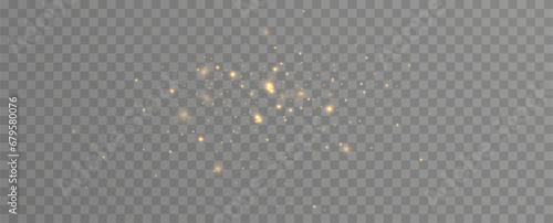 Golden sequins glow with many lights. Glittering dust. Luxurious background of golden particles.