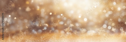 Winter snowy blurred defocused blue background, golden boleh with copy space. Flakes of snow fall. Festive Christmas and New year background © jchizhe