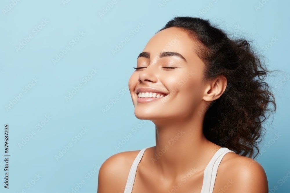 smiling woman enjoying beauty treatment on blue background. AI Generated smiling woman enjoying beauty treatment on blue background. AI Generated