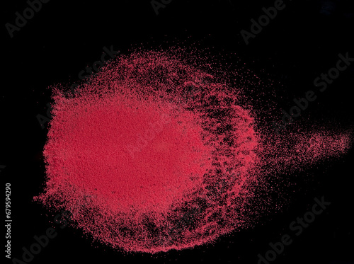 Small size red Sand flying explosion  blood sands grain wave explode. Abstract cloud fly. Red colored sand splash throwing in Air. black background Isolated high speed shutter  throwing freeze stop