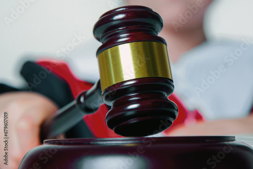 Close up judge (lawyer) makes a decision. Horizontal image. photo