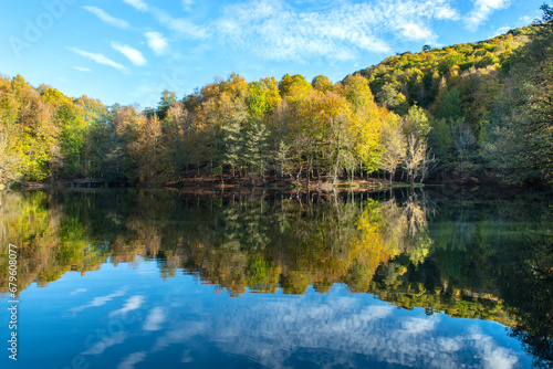 Yedigöller or Seven Lakes National Park is in Turkey.
Reflection of a lake with trees and blue sky in autumn colors. Yedigöller, Bolu.
Yedigöller in autumn. Bolu, Türkiye.
