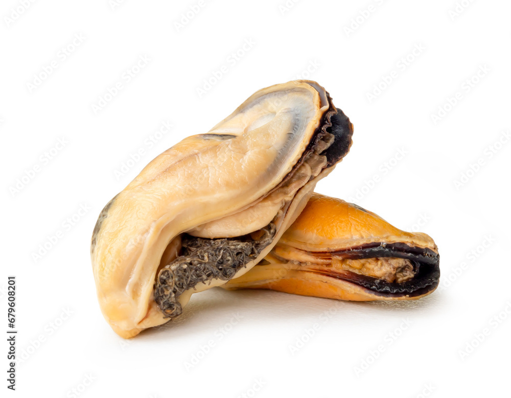 Steamed or cooked food of fresh beautiful green mussels in stack or cross shape without shells isolated on white background with clipping path