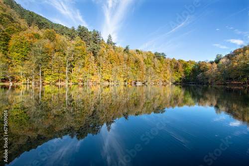 Yedigöller or Seven Lakes National Park is in Turkey.
Reflection of a lake with trees and blue sky in autumn colors. Yedigöller, Bolu.
Yedigöller in autumn. Bolu, Türkiye.