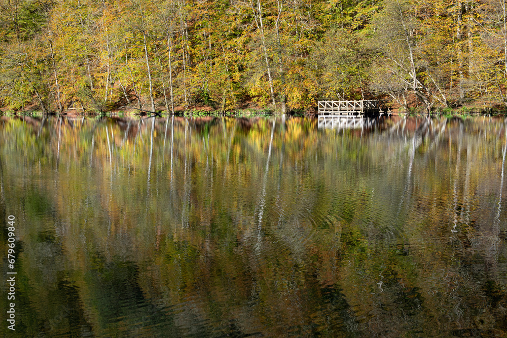 Yedigöller or Seven Lakes National Park is in Turkey.
Reflection of a lake with trees and blue sky in autumn colors. Yedigöller, Bolu.
Yedigöller in autumn. Bolu, Türkiye.