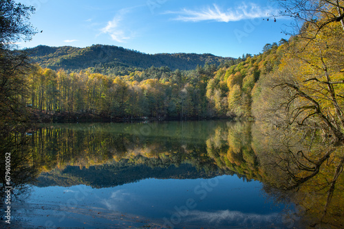 Yedigöller or Seven Lakes National Park is in Turkey.
Reflection of a lake with trees and blue sky in autumn colors. Yedigöller, Bolu.
Yedigöller in autumn. Bolu, Türkiye.