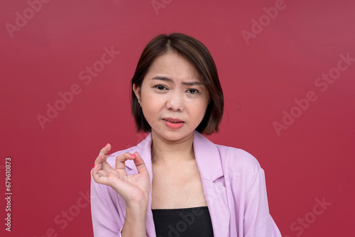 Obraz na plátně A snobbish young woman making a condescending explanation to someone she looks down on
