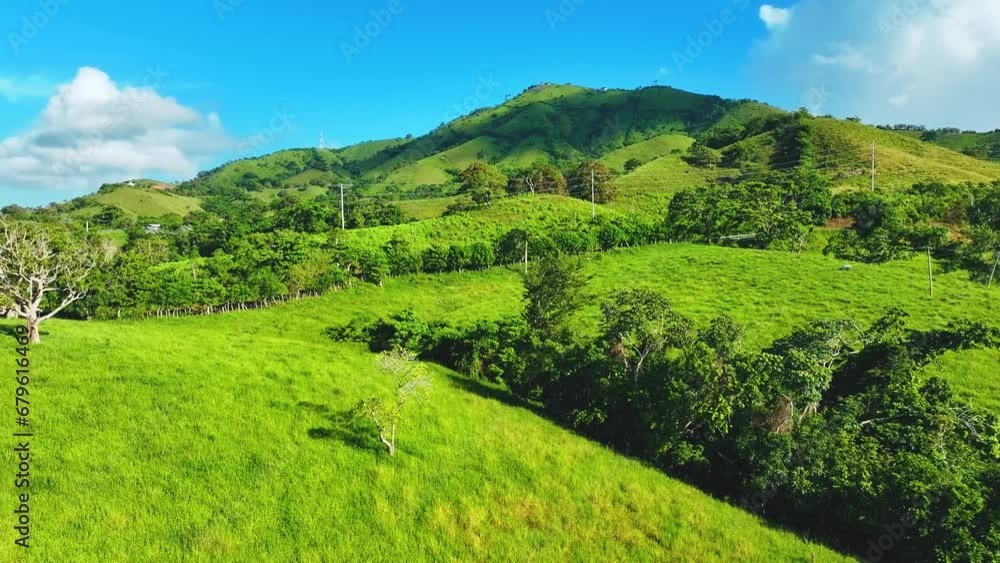 Amazing mountain landscape. Panorama of the beautiful wildlife of Latin America. Dominican Republic mountain range in morning sunlight. World of beauty. Tourism and recreation concept. Amazing mountain landscape. Panorama of the beautiful wildlife of Latin America. Dominican Republic mountain range in morning sunlight. World of beauty. Tourism and recreation concept.
