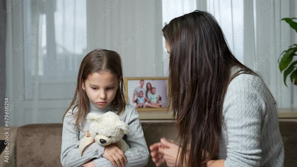Angry mother scolds a crying daughter Angry mother scolds a crying daughter